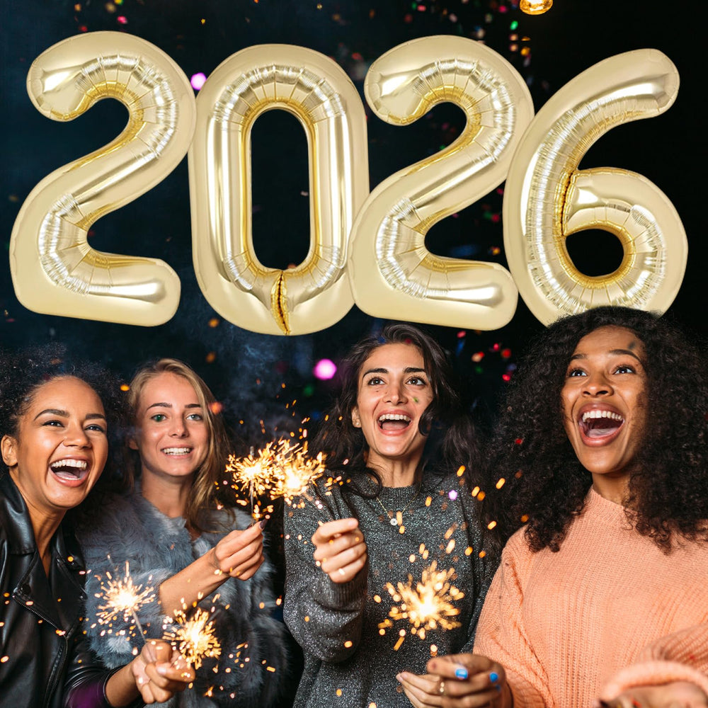 Kalor New Year or graduation decor idea with balloons and backdrop.