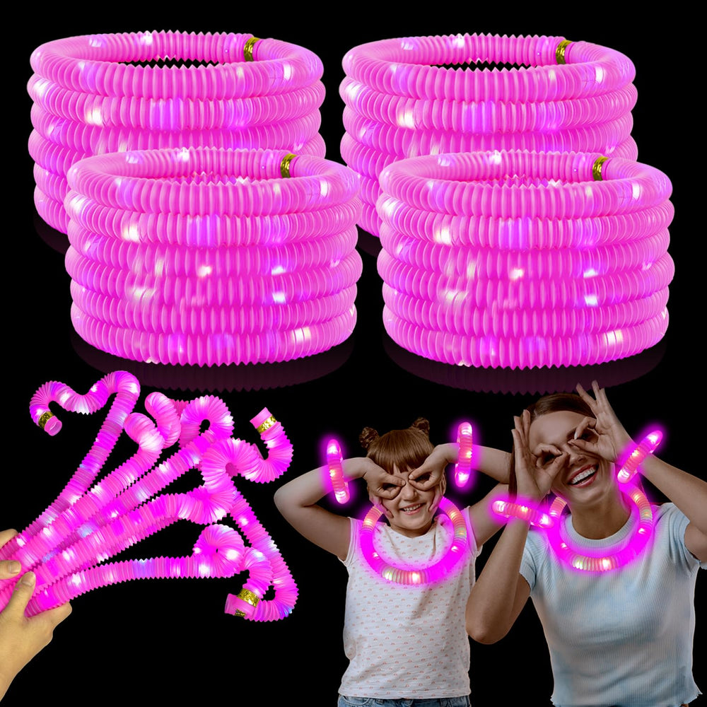 Kannove pink glow sticks used as bracelets for a bright party.