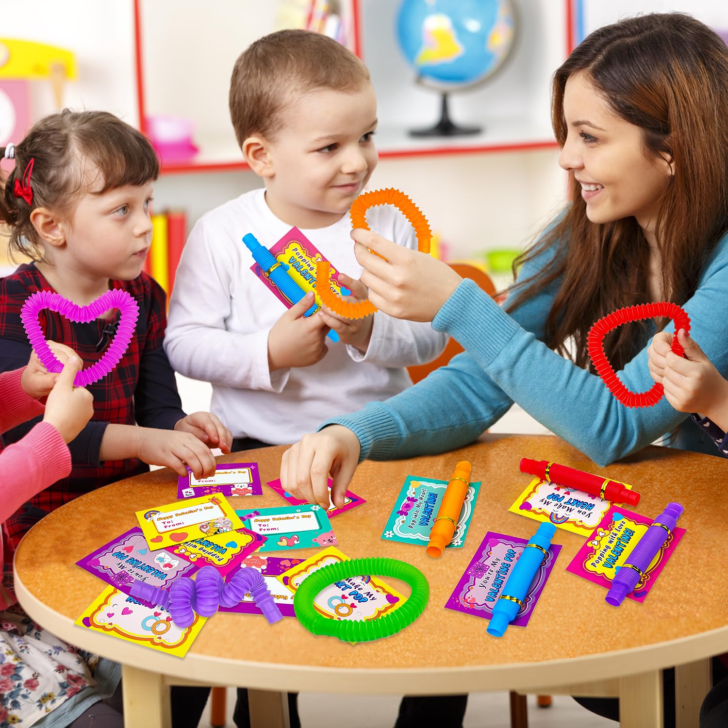 Kannove Pop Tubes writing names on cards for personalized gifts.
