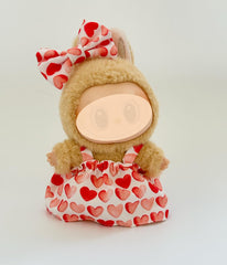 Kapand Labubu pink heart bow accessory adds charm to the doll.