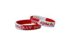 Kappa Alpha Psi silicone bracelet red close-up showing debossed color for daily wear.