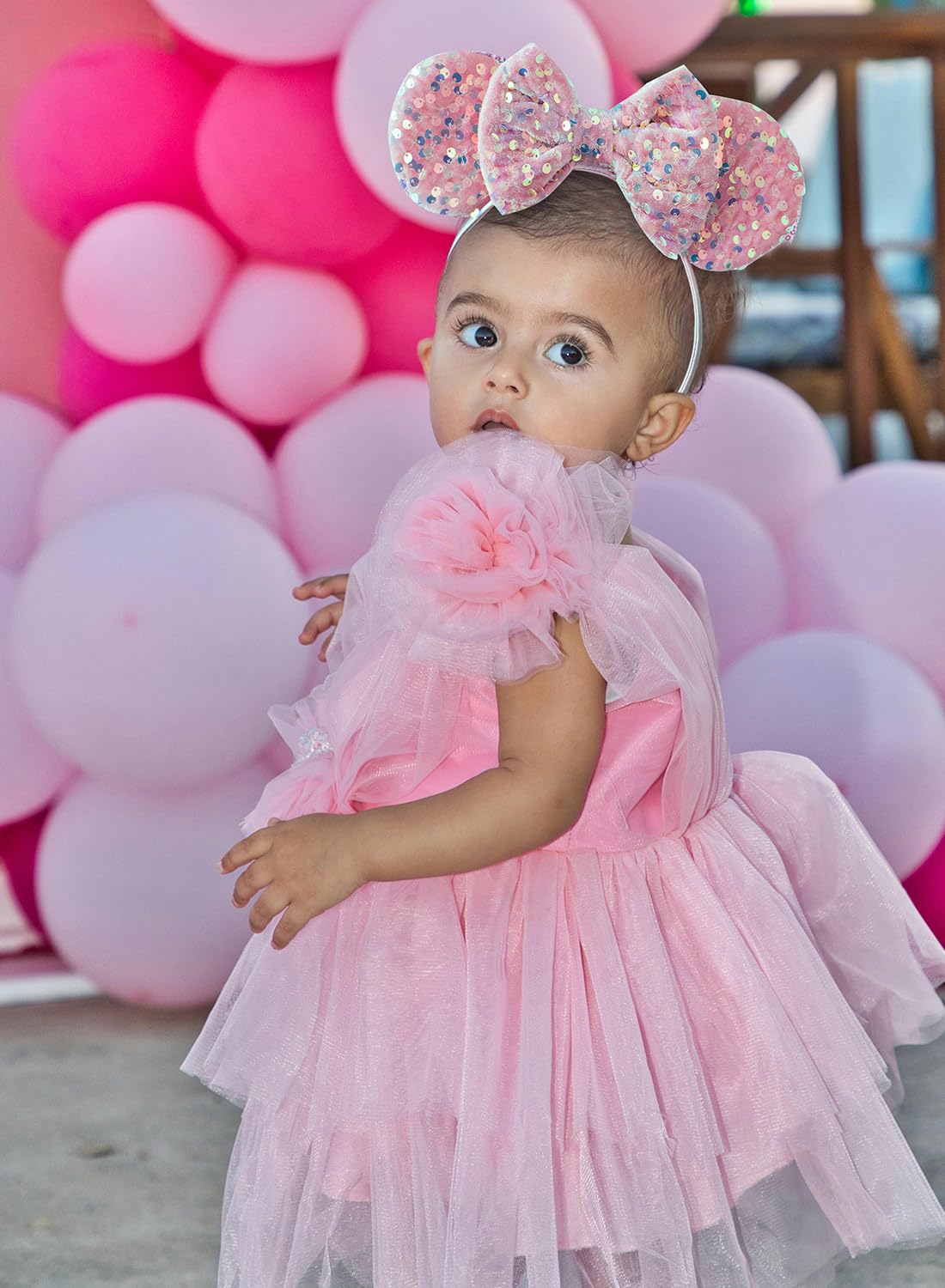 KARETT glitter bow headband on model, great for fans and costume parties.