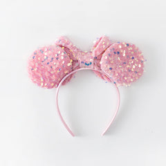 KARETT one-size-fits-all headband with glitter ears for fun day outs.