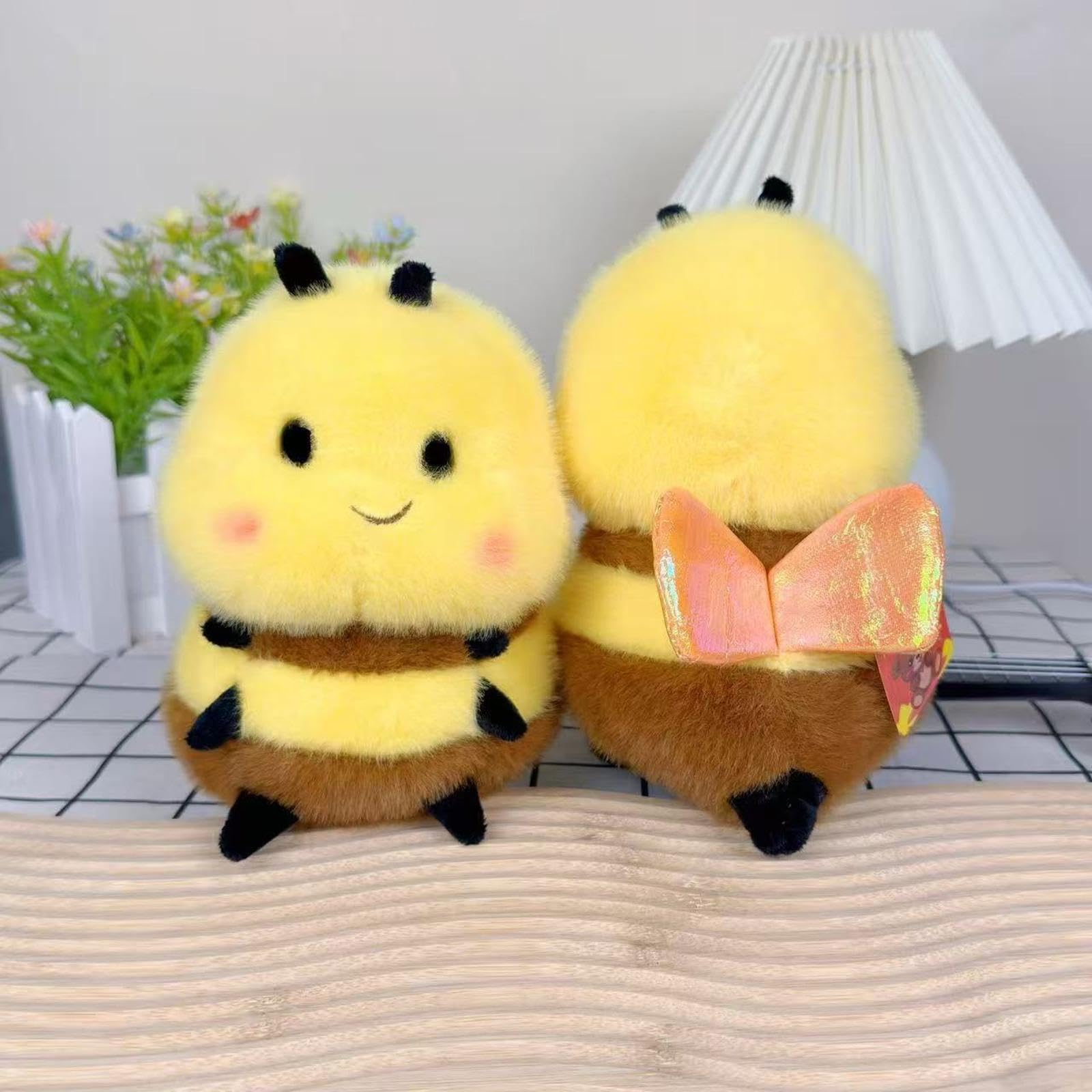 Karoeiwa Realistic Bee plush as a desk companion for creativity.
