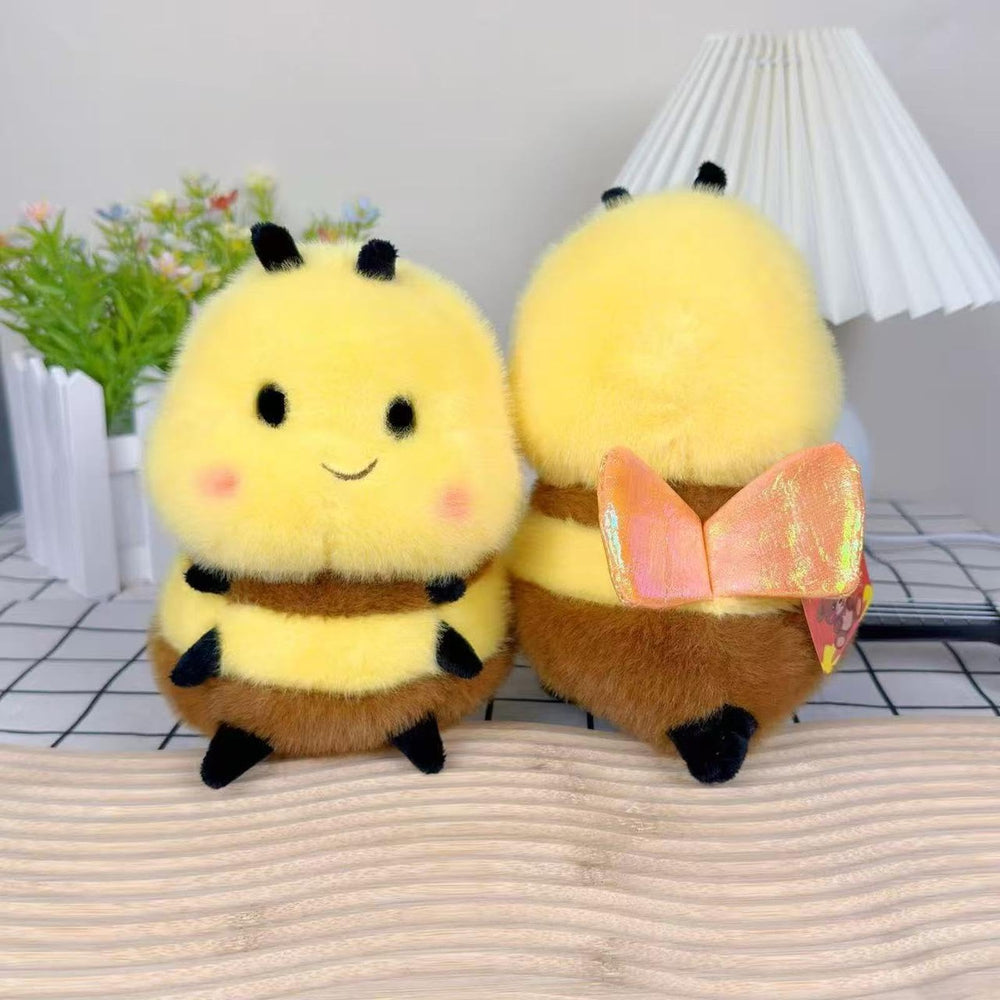 Karoeiwa Realistic Bee plush as a desk companion for creativity.