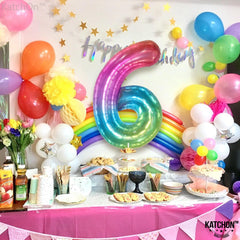 KatchOn 6th birthday balloon decor for girls creates magical rainbow vibes.