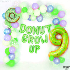 KatchOn candy-sprinkle donut balloon complements candy décor.