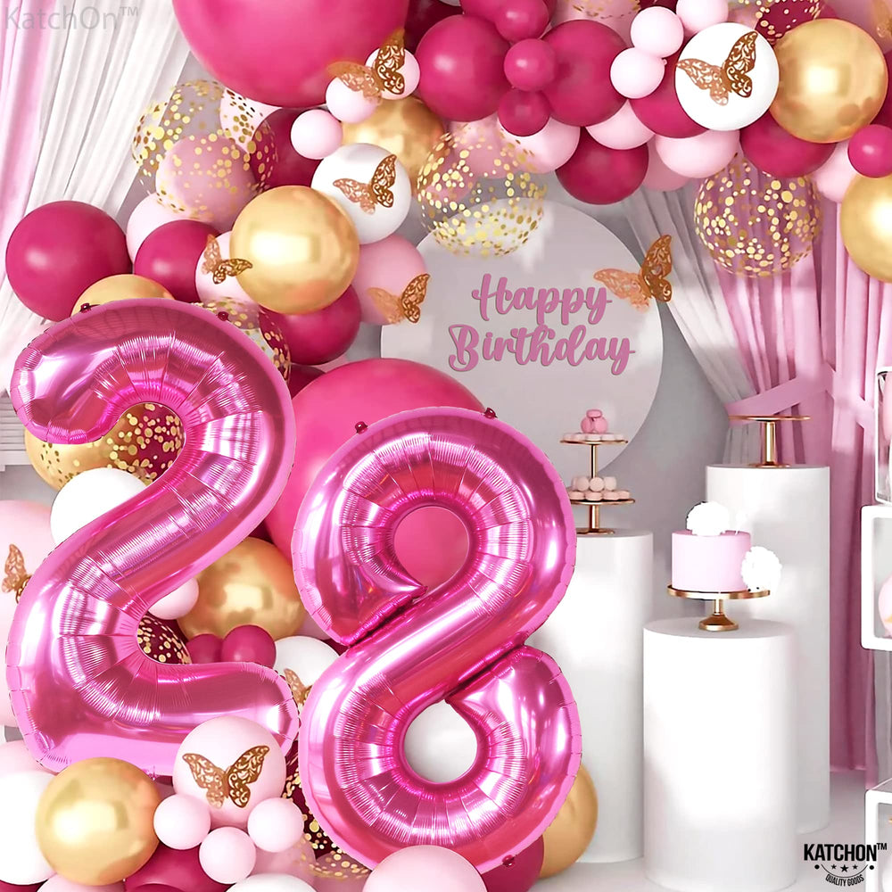 KatchOn giant number 28 balloon in pink adds wow factor to the setup.