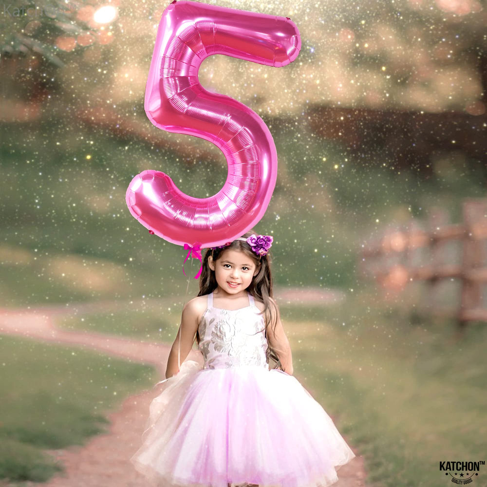 KatchOn giant pink birthday decor stands out in group photos and celebrations