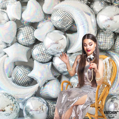 KatchOn silver birthday decor with bold disco ball balloons.