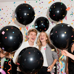 KAWKALSH Balloons floating over a banquet hall, adding a festive feel.