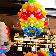 KAWKALSH glue dots secure the arrangement for events.