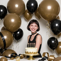 KAWKALSH natural elegant decor balloons pair with greenery and wood textures.