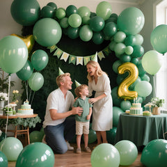 KAWKALSH sage green balloons pair with terracotta and dried botanicals