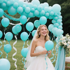 KAWKALSH closeup of teal blue latex balloons showing texture