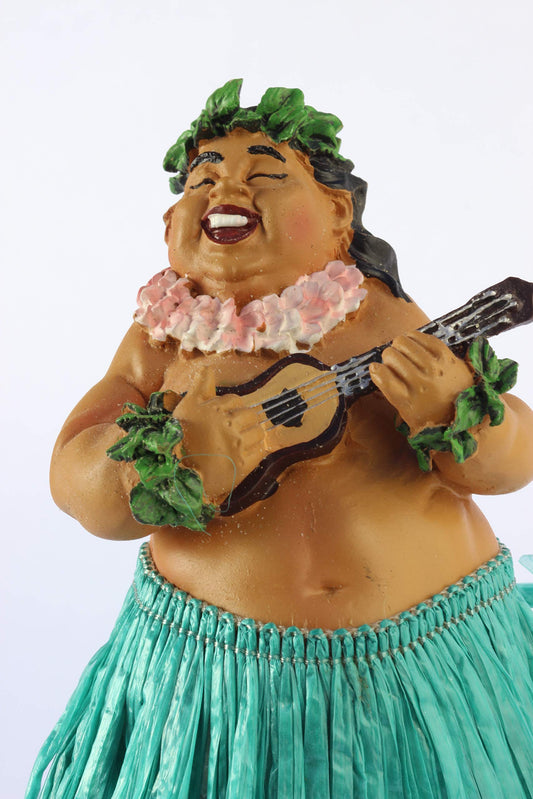 KC Hawaii hula doll displayed on desk adding playful island vibe