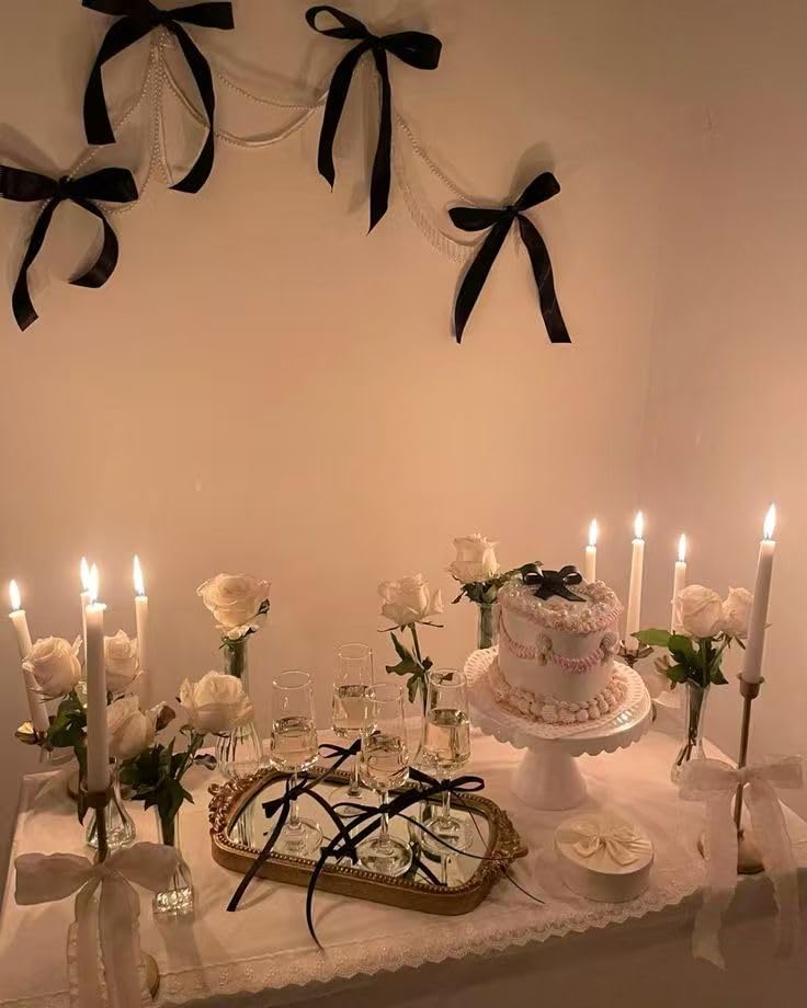 Keaziu black bow cake topper on cake adds chic coquette flair.
