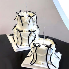 Keaziu black bow cupcake toppers, assembled and ready to insert for elegant party decor.