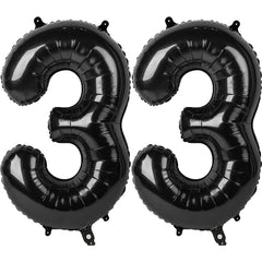Kelfuoya 40-inch black 33 balloon displayed on a wall for party decor