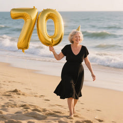 Kelfuoya gold number 70 foil balloon creates a stunning backdrop for photos.
