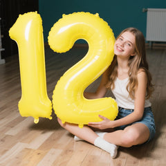 Kelfuoya 40-inch Macaron Yellow Number 1 balloon in a birthday scene for memorable photos.
