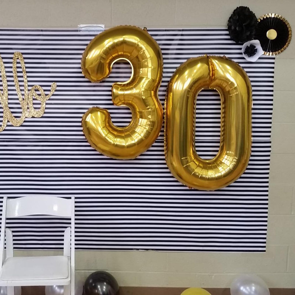 Kelfuoya giant-number balloon 30th for milestone celebrations indoors or outdoors.