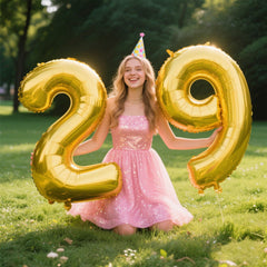 Kelfuoya gold 29th birthday balloon brightens stages and photos.