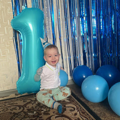 Kelfuoya jumbo number 12 digital balloon creates a dramatic party backdrop.