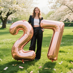Kelfuoya rose gold 27 balloon featured in a birthday party setting.