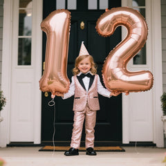 Kelfuoya rose gold 40-inch balloon setup adds elegance to celebrations.