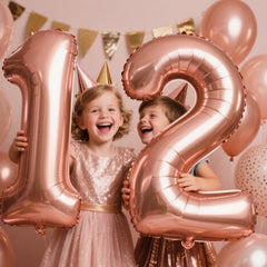 Kelfuoya rose gold birthday backdrop with 12 balloons for festive photos.