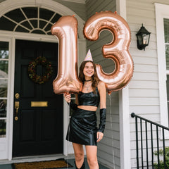 Kelfuoya rose gold number 1 balloon used as centerpiece for 1st birthday