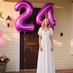 Kelfuoya wall-display balloon, rose purple 40-inch shines as a backdrop.