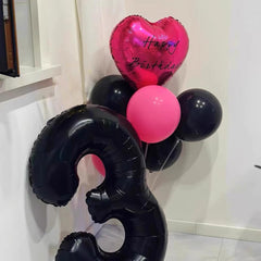 Kelfuoya wedding and anniversary decor using the black number 13 balloon centerpiece