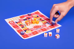 Players roll Chicken! dice for fast, exciting turns