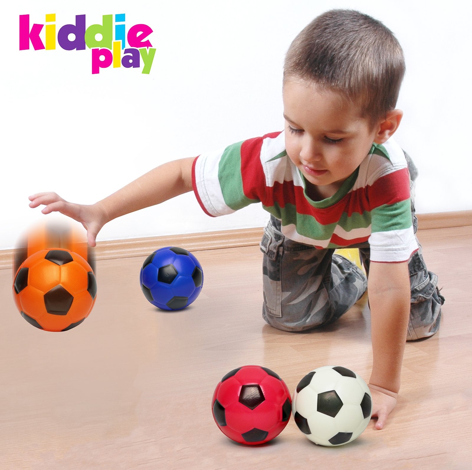 Kiddie Play child holding a 4-inch ball, easy-to-grasp design for beginners