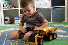 KIDDITOY Mighty RC dump truck high-grip tires on varied terrain