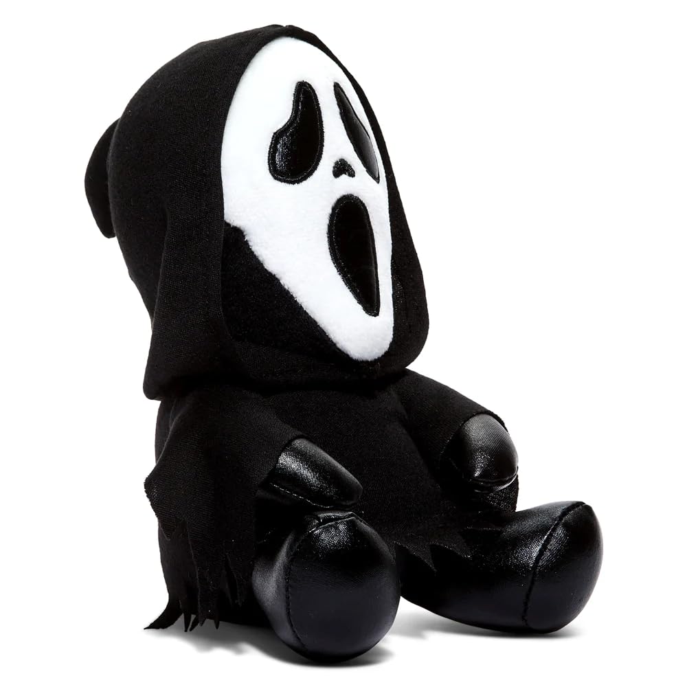 Soft materials enhance the comforting, collectible feel of Kidrobot Ghost Face plush.
