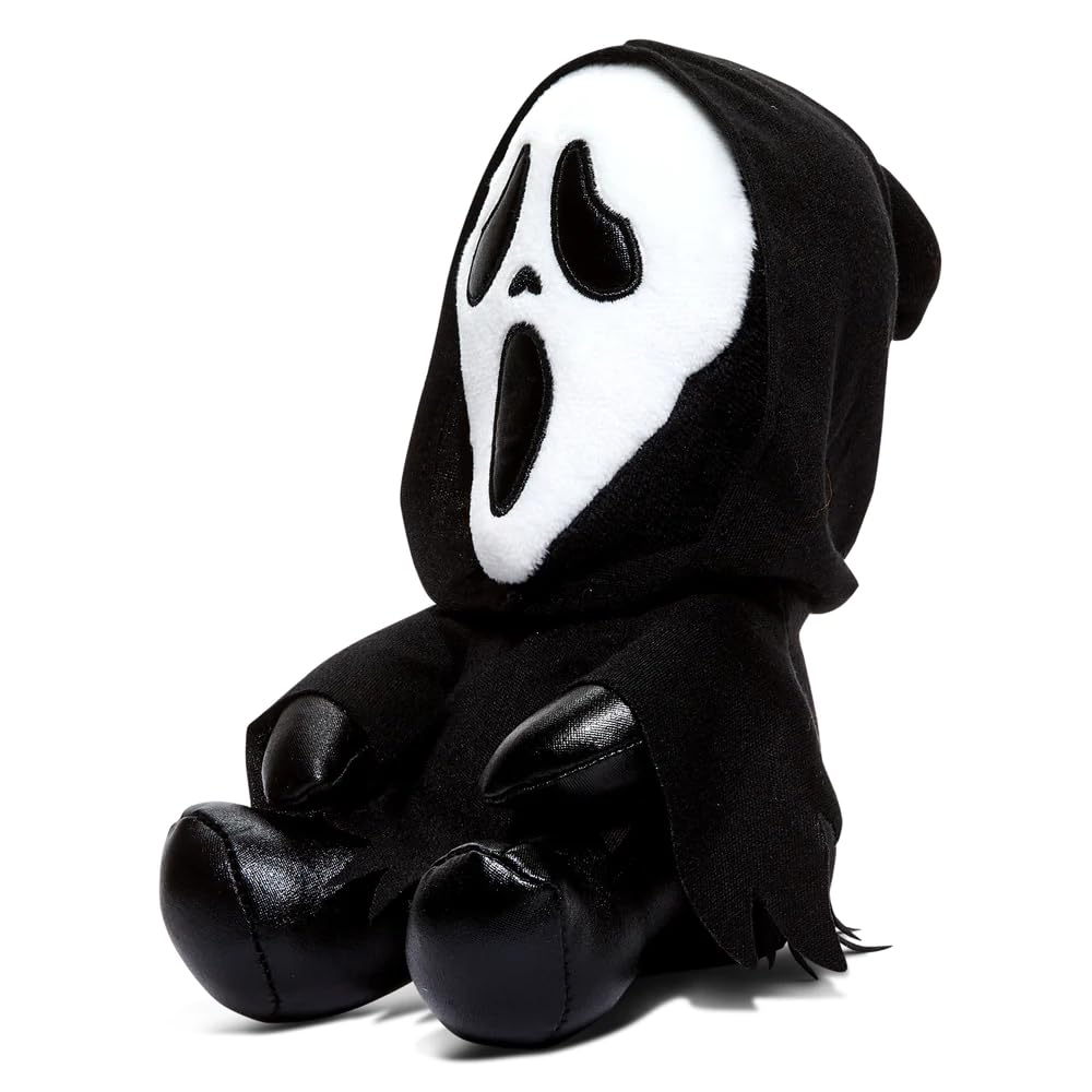 Kidrobot Ghost Face plush seated, cuddly companion for fans of playful horror.