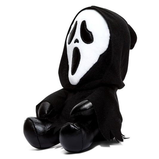Kidrobot Ghost Face plush seated, cuddly companion for fans of playful horror.