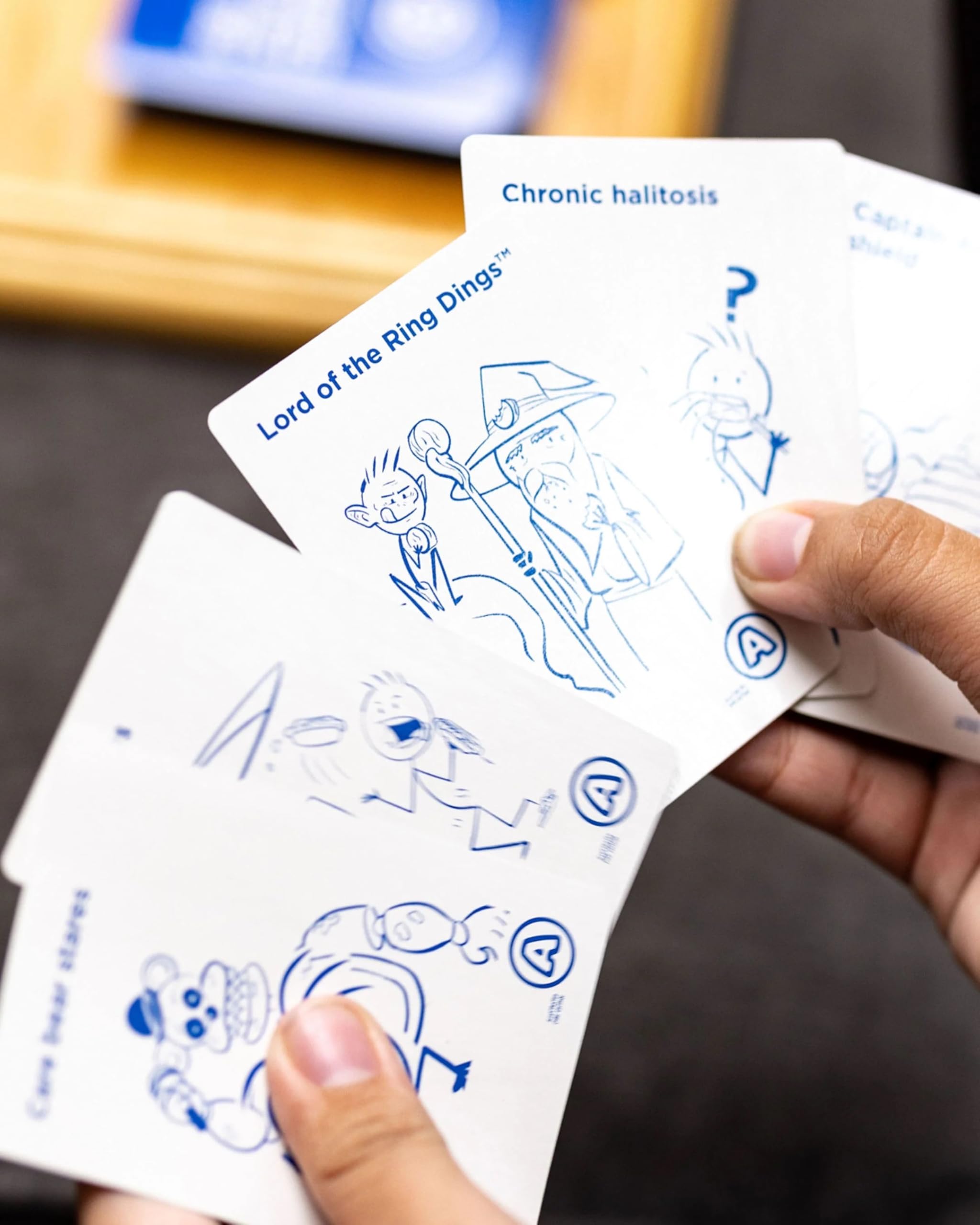 Answer cards fanned for fast, humorous rounds with Kids Against Maturity