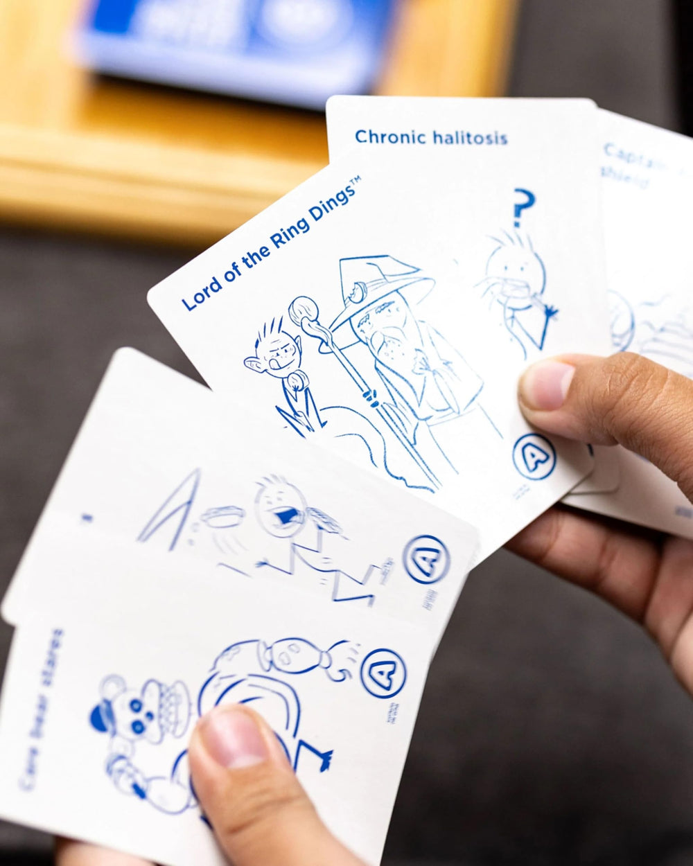 Answer cards fanned for fast, humorous rounds with Kids Against Maturity