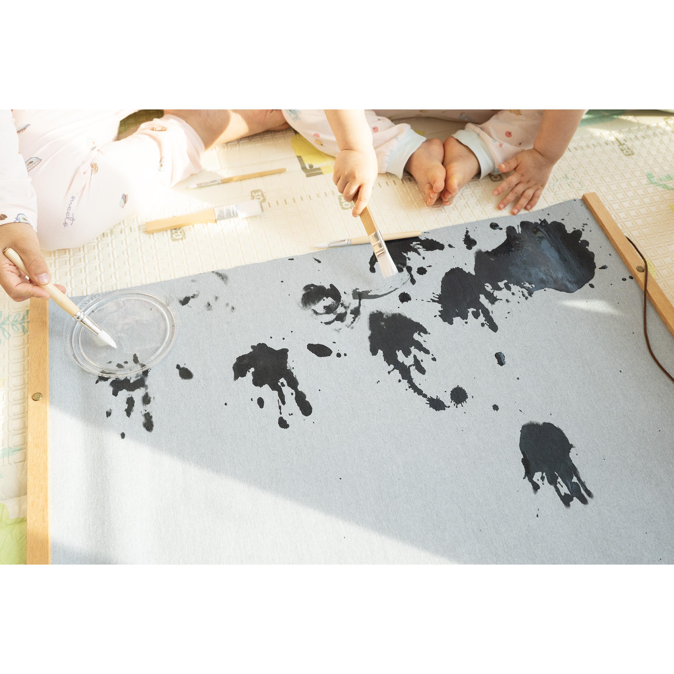 Kids Magic Water Poster large doodle mat for mess-free drawing on the go.
