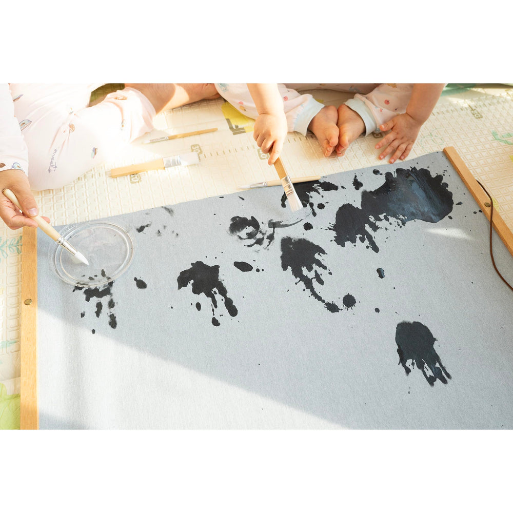 Kids Magic Water Poster large doodle mat for mess-free drawing on the go.