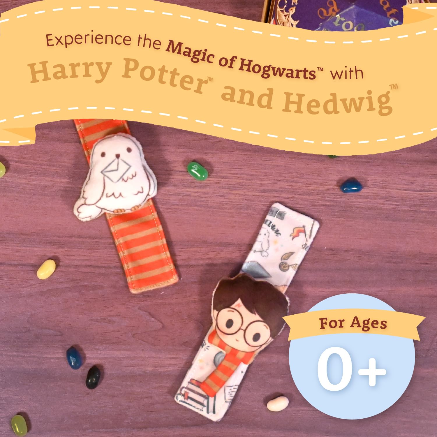 Baby exploring with Hedwig rattle during arm exploration encourages tactile curiosity
