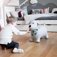 Kindsgut Bouncy Animal Hopper Dog front view showing secure seat and handles