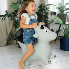 Kindsgut Dino Hopper outdoors on grass for active outdoor fun.