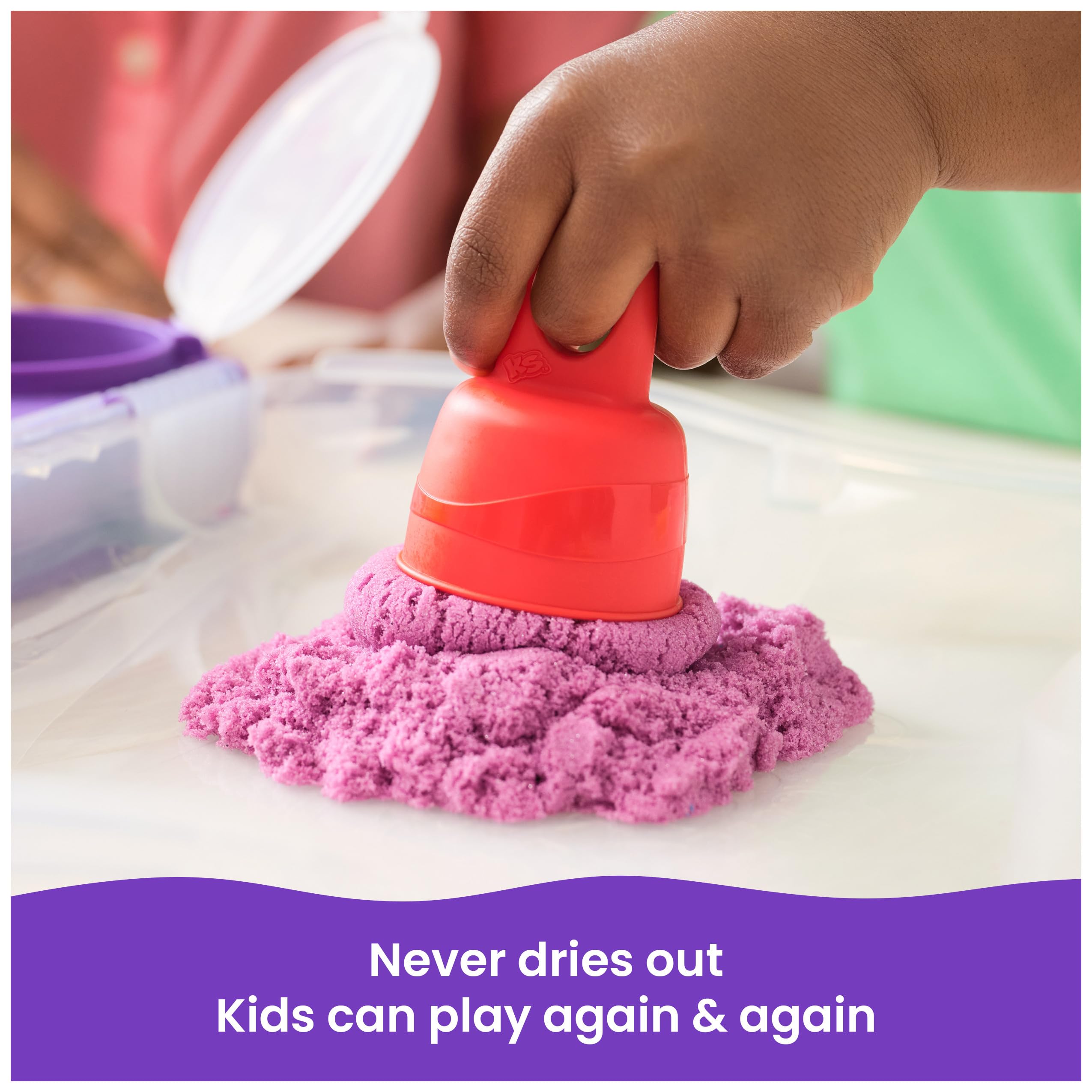 Kinetic Sand neon white sand contrasts with colorful builds for bold art