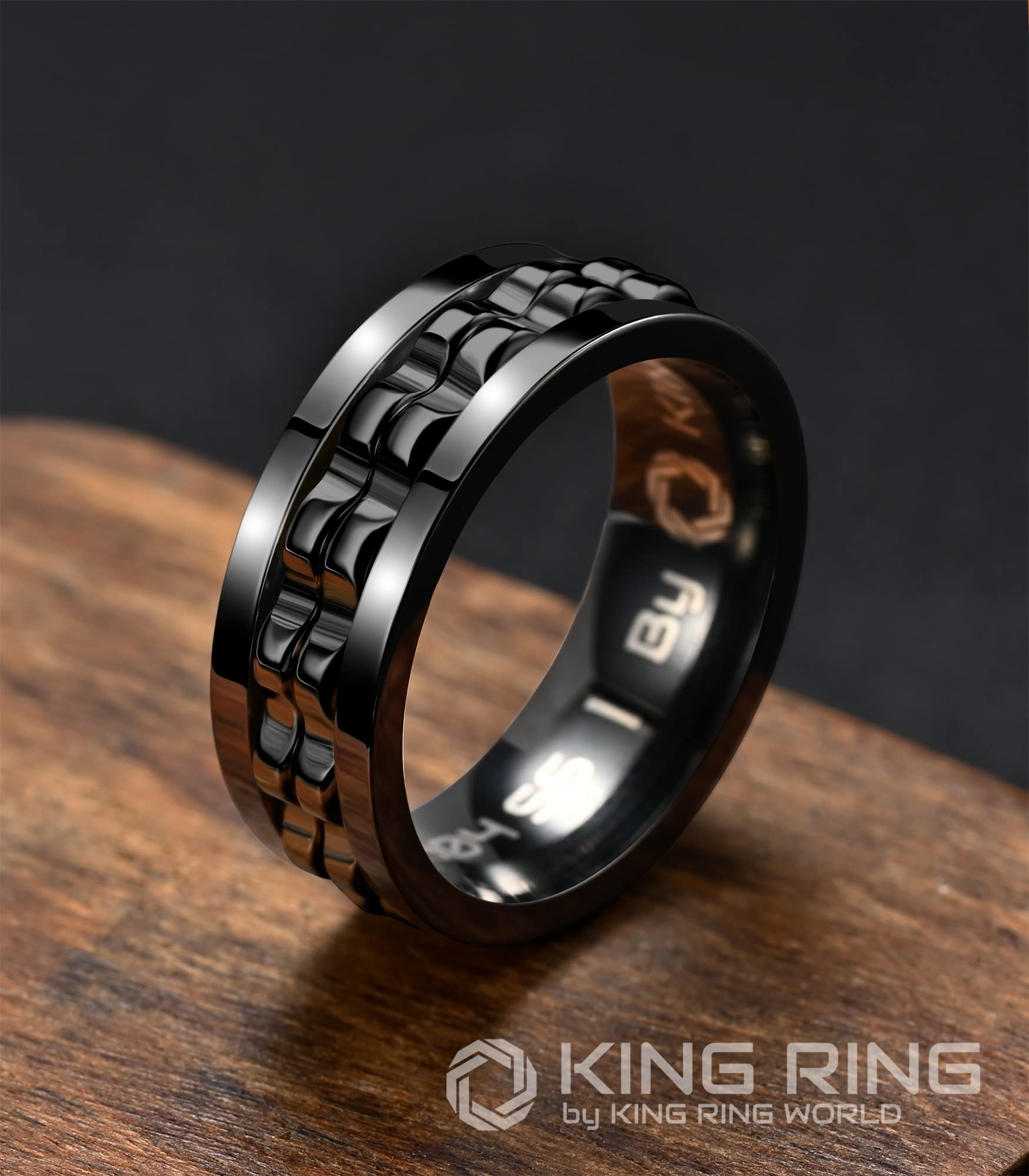 Close-up of King Ring ultra-polished stainless steel gear-spinner for durability.