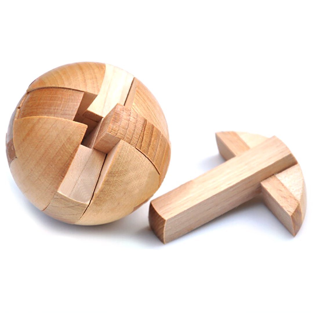 Kingou compact puzzle ball held in hand for portability.